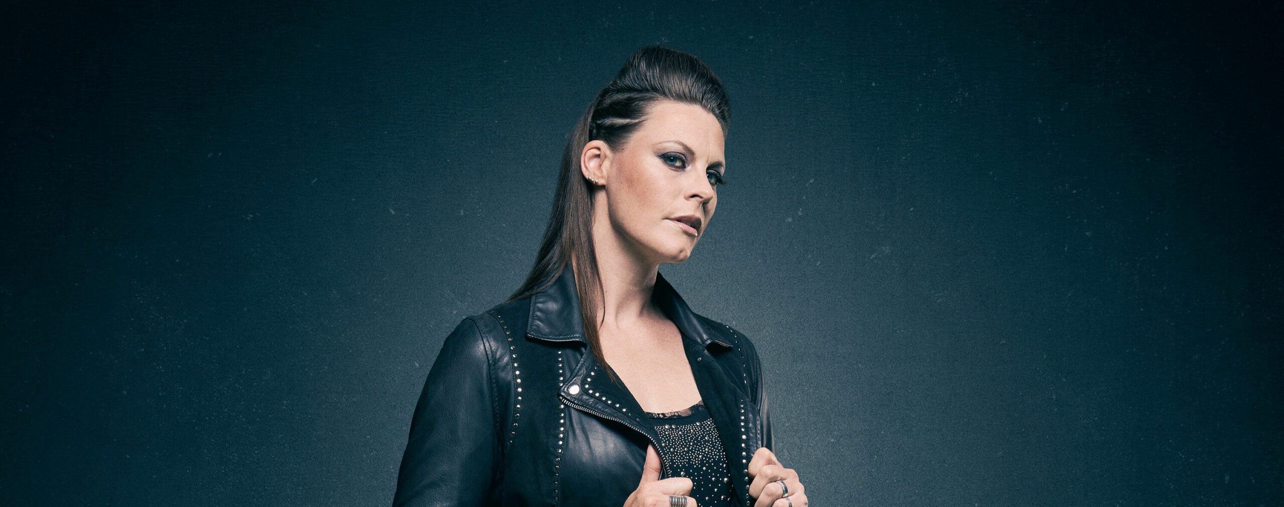 https://rocknfool.net/wp-content/uploads/2022/07/Floor-Jansen-scaled.jpg